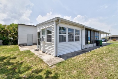 Live the dream in this beautifully updated 2BR/2BA home in on Barefoot Bay Golf Course in Florida - for sale on GolfHomes.com, golf home, golf lot