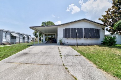 Live the dream in this beautifully updated 2BR/2BA home in on Barefoot Bay Golf Course in Florida - for sale on GolfHomes.com, golf home, golf lot