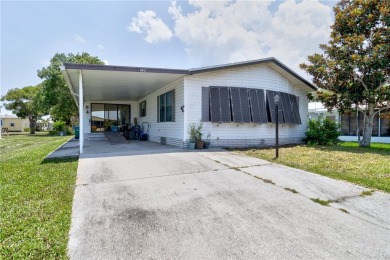 Live the dream in this beautifully updated 2BR/2BA home in on Barefoot Bay Golf Course in Florida - for sale on GolfHomes.com, golf home, golf lot