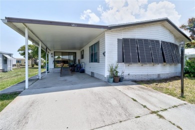 Live the dream in this beautifully updated 2BR/2BA home in on Barefoot Bay Golf Course in Florida - for sale on GolfHomes.com, golf home, golf lot