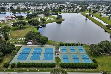 Live the dream in this beautifully updated 2BR/2BA home in on Barefoot Bay Golf Course in Florida - for sale on GolfHomes.com, golf home, golf lot
