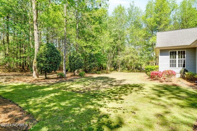 Welcome to 227 October Drive, a charming Craftsman-style home on River Landing Golf Course in North Carolina - for sale on GolfHomes.com, golf home, golf lot