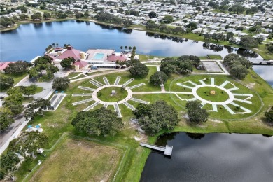 Live the dream in this beautifully updated 2BR/2BA home in on Barefoot Bay Golf Course in Florida - for sale on GolfHomes.com, golf home, golf lot