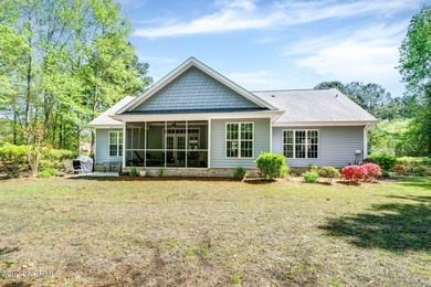 Welcome to 227 October Drive, a charming Craftsman-style home on River Landing Golf Course in North Carolina - for sale on GolfHomes.com, golf home, golf lot