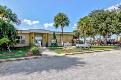 Live the dream in this beautifully updated 2BR/2BA home in on Barefoot Bay Golf Course in Florida - for sale on GolfHomes.com, golf home, golf lot