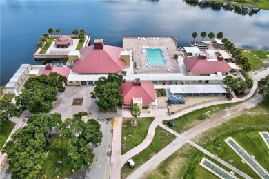 Live the dream in this beautifully updated 2BR/2BA home in on Barefoot Bay Golf Course in Florida - for sale on GolfHomes.com, golf home, golf lot