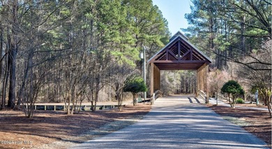 Welcome to 227 October Drive, a charming Craftsman-style home on River Landing Golf Course in North Carolina - for sale on GolfHomes.com, golf home, golf lot