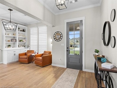 This stunning 4-bedroom, 2-bath home blends modern design with on Wolf Ridge Golf Course in Oklahoma - for sale on GolfHomes.com, golf home, golf lot