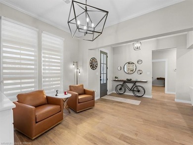 This stunning 4-bedroom, 2-bath home blends modern design with on Wolf Ridge Golf Course in Oklahoma - for sale on GolfHomes.com, golf home, golf lot