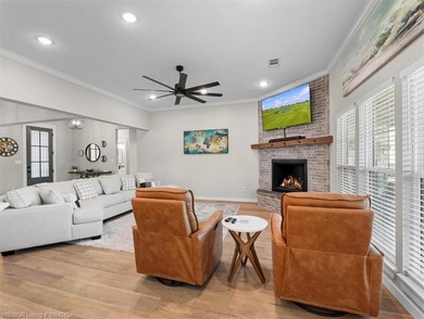 This stunning 4-bedroom, 2-bath home blends modern design with on Wolf Ridge Golf Course in Oklahoma - for sale on GolfHomes.com, golf home, golf lot