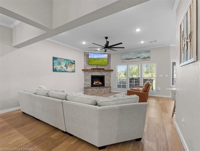 This stunning 4-bedroom, 2-bath home blends modern design with on Wolf Ridge Golf Course in Oklahoma - for sale on GolfHomes.com, golf home, golf lot