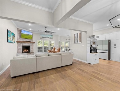 This stunning 4-bedroom, 2-bath home blends modern design with on Wolf Ridge Golf Course in Oklahoma - for sale on GolfHomes.com, golf home, golf lot