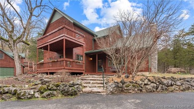 Welcome to this enchanting rustic retreat nestled within the on The Club At Old Kinderhook in Missouri - for sale on GolfHomes.com, golf home, golf lot