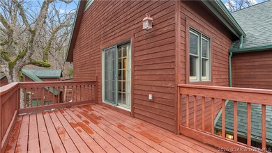 Welcome to this enchanting rustic retreat nestled within the on The Club At Old Kinderhook in Missouri - for sale on GolfHomes.com, golf home, golf lot