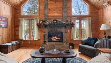 Welcome to this enchanting rustic retreat nestled within the on The Club At Old Kinderhook in Missouri - for sale on GolfHomes.com, golf home, golf lot