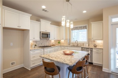 Discover relaxed, resort-style living in this charming on Lanier Island Legacy Golf Couorse in Georgia - for sale on GolfHomes.com, golf home, golf lot