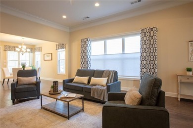 Discover relaxed, resort-style living in this charming on Lanier Island Legacy Golf Couorse in Georgia - for sale on GolfHomes.com, golf home, golf lot