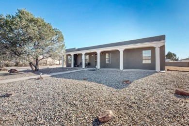 This property offers nearly 1/4 of an acre lot in a golf course on Tierra Del Sol Golf Course in New Mexico - for sale on GolfHomes.com, golf home, golf lot