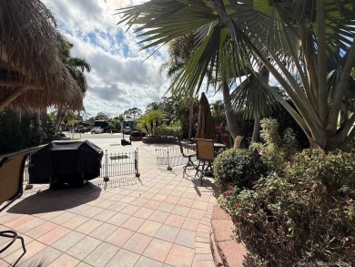 Discover the ultimate blend of luxury and convenience with this on Motorcoach Resort Golf Course in Florida - for sale on GolfHomes.com, golf home, golf lot