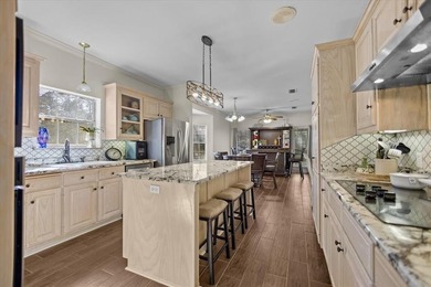 Discover this exceptional 3 or 4 bedroom, 3.5 bathroom gem on Hide-A-Way Lake Golf Course in Texas - for sale on GolfHomes.com, golf home, golf lot