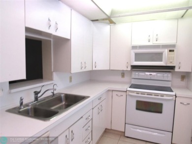 REDUCED! PRICED TO INVEST & FLIP OR TAKE ADVANTAGE OF A BLANK on Wynmoor Golf Course in Florida - for sale on GolfHomes.com, golf home, golf lot