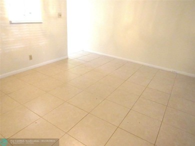 REDUCED! PRICED TO INVEST & FLIP OR TAKE ADVANTAGE OF A BLANK on Wynmoor Golf Course in Florida - for sale on GolfHomes.com, golf home, golf lot