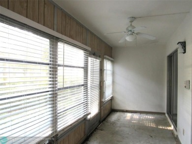 REDUCED! PRICED TO INVEST & FLIP OR TAKE ADVANTAGE OF A BLANK on Wynmoor Golf Course in Florida - for sale on GolfHomes.com, golf home, golf lot