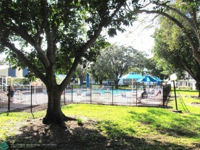 REDUCED! PRICED TO INVEST & FLIP OR TAKE ADVANTAGE OF A BLANK on Wynmoor Golf Course in Florida - for sale on GolfHomes.com, golf home, golf lot