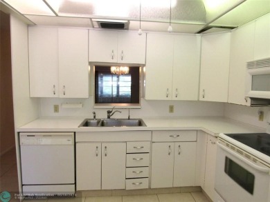 REDUCED! PRICED TO INVEST & FLIP OR TAKE ADVANTAGE OF A BLANK on Wynmoor Golf Course in Florida - for sale on GolfHomes.com, golf home, golf lot