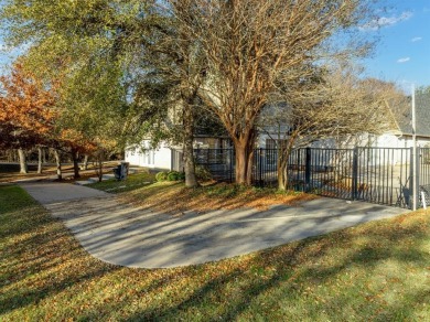 Discover luxury living in this expansive five-bedroom home on White Bluff Resort - Old Course in Texas - for sale on GolfHomes.com, golf home, golf lot