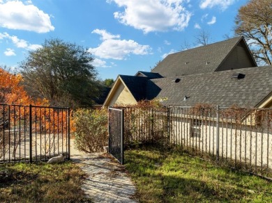 Discover luxury living in this expansive five-bedroom home on White Bluff Resort - Old Course in Texas - for sale on GolfHomes.com, golf home, golf lot