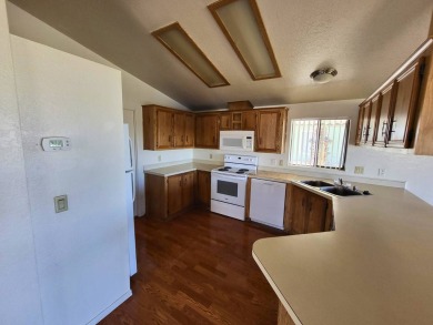 Located in the all-ages community, Mesa Bluff Village, this on Blythe Municipal Golf Course in California - for sale on GolfHomes.com, golf home, golf lot