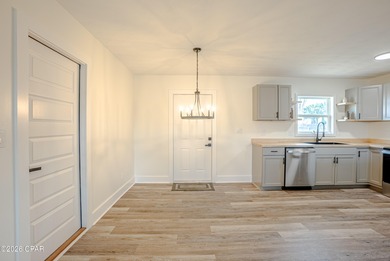 Completely Remodeled & Perfectly Located in Lynn Haven! Welcome on Panama Country Club in Florida - for sale on GolfHomes.com, golf home, golf lot