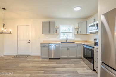 Completely Remodeled & Perfectly Located in Lynn Haven! Welcome on Panama Country Club in Florida - for sale on GolfHomes.com, golf home, golf lot