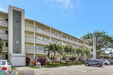 BEST VALUE IN CAMBRIDGE FOR ONE A BEDROOM! IMPACT WINDOWS FRONT on Hillsboro Pines Golf in Florida - for sale on GolfHomes.com, golf home, golf lot