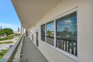 BEST VALUE IN CAMBRIDGE FOR ONE A BEDROOM! IMPACT WINDOWS FRONT on Hillsboro Pines Golf in Florida - for sale on GolfHomes.com, golf home, golf lot