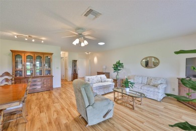 PANORAMIC GREENBELT with a WATER VIEW is TURNKEY! This SUPER on Falcon Watch Golf Club in Florida - for sale on GolfHomes.com, golf home, golf lot
