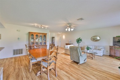 PANORAMIC GREENBELT with a WATER VIEW is TURNKEY! This SUPER on Falcon Watch Golf Club in Florida - for sale on GolfHomes.com, golf home, golf lot