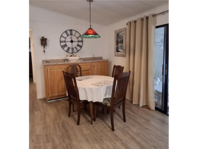 A great location for year-round or seasonal use. Within walking on Barefoot Bay Golf Course in Florida - for sale on GolfHomes.com, golf home, golf lot