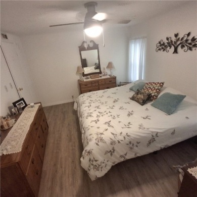 A great location for year-round or seasonal use. Within walking on Barefoot Bay Golf Course in Florida - for sale on GolfHomes.com, golf home, golf lot