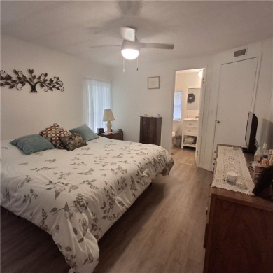 A great location for year-round or seasonal use. Within walking on Barefoot Bay Golf Course in Florida - for sale on GolfHomes.com, golf home, golf lot