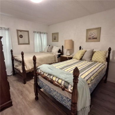 A great location for year-round or seasonal use. Within walking on Barefoot Bay Golf Course in Florida - for sale on GolfHomes.com, golf home, golf lot