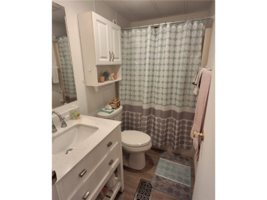 A great location for year-round or seasonal use. Within walking on Barefoot Bay Golf Course in Florida - for sale on GolfHomes.com, golf home, golf lot