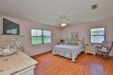 PANORAMIC GREENBELT with a WATER VIEW is TURNKEY! This SUPER on Falcon Watch Golf Club in Florida - for sale on GolfHomes.com, golf home, golf lot