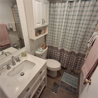A great location for year-round or seasonal use. Within walking on Barefoot Bay Golf Course in Florida - for sale on GolfHomes.com, golf home, golf lot