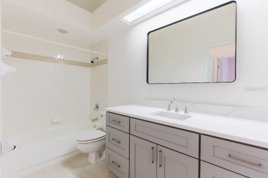 This centrally located 3 bedroom, 2 bath villa on Palm Aire Golf on University Park Country Club in Florida - for sale on GolfHomes.com, golf home, golf lot