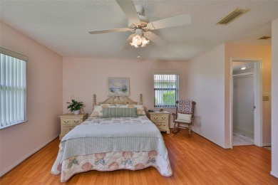PANORAMIC GREENBELT with a WATER VIEW is TURNKEY! This SUPER on Falcon Watch Golf Club in Florida - for sale on GolfHomes.com, golf home, golf lot