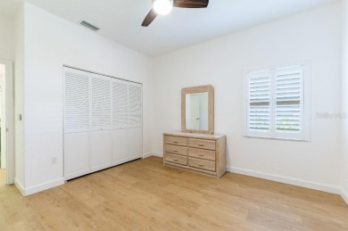This centrally located 3 bedroom, 2 bath villa on Palm Aire Golf on University Park Country Club in Florida - for sale on GolfHomes.com, golf home, golf lot