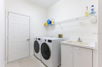 This centrally located 3 bedroom, 2 bath villa on Palm Aire Golf on University Park Country Club in Florida - for sale on GolfHomes.com, golf home, golf lot