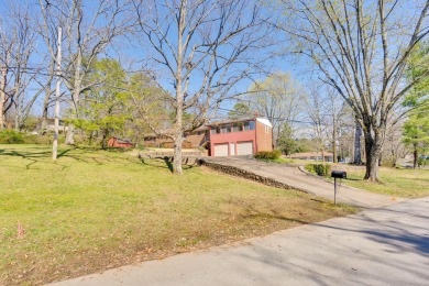 Welcome to 1109 James Blvd, a stunning traditional brick home on Signal Mountain Golf and Country Club in Tennessee - for sale on GolfHomes.com, golf home, golf lot